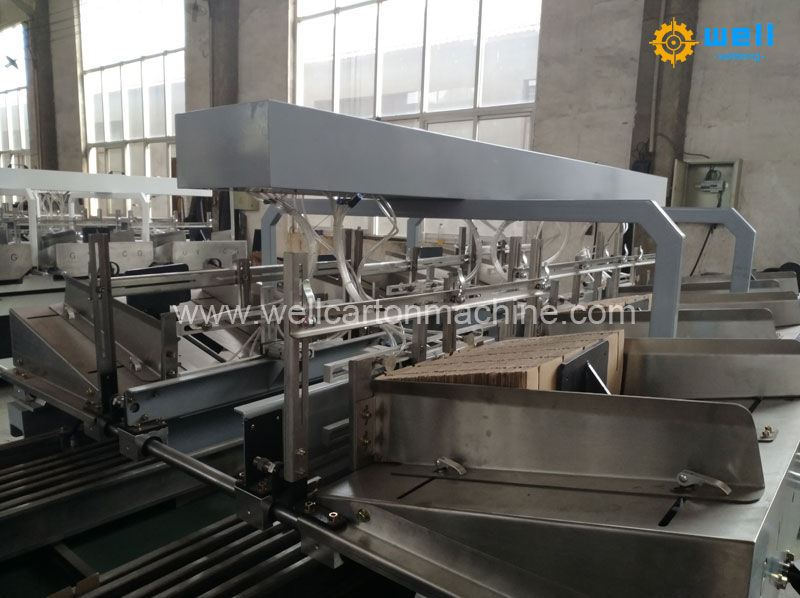 Three insert corrugated cardboard partition assembly machine