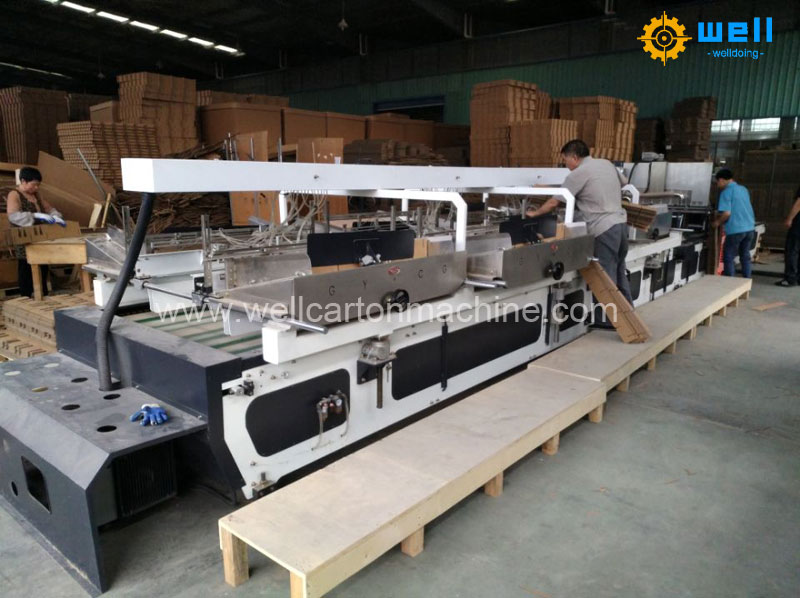 Milk box automatic partition assembler machine