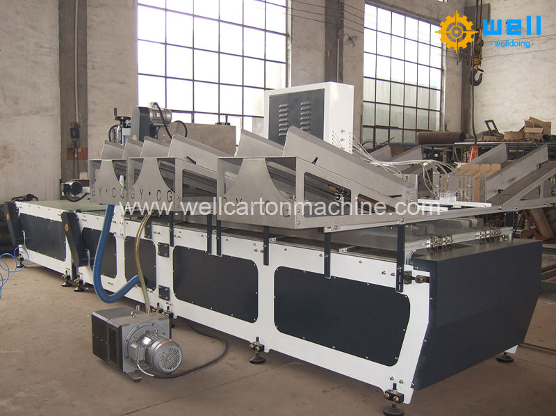 Auto corrugated partition assembler