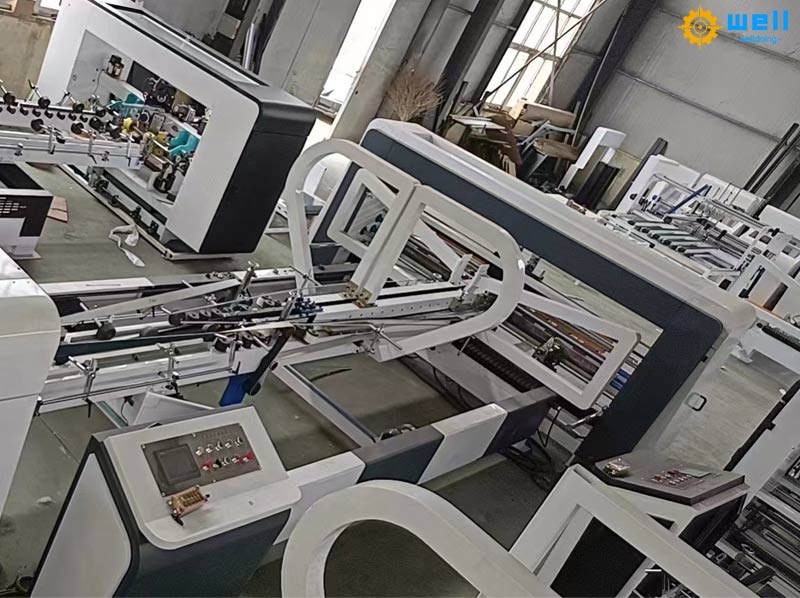 Automatic corrugated paperboard folding gluing machine