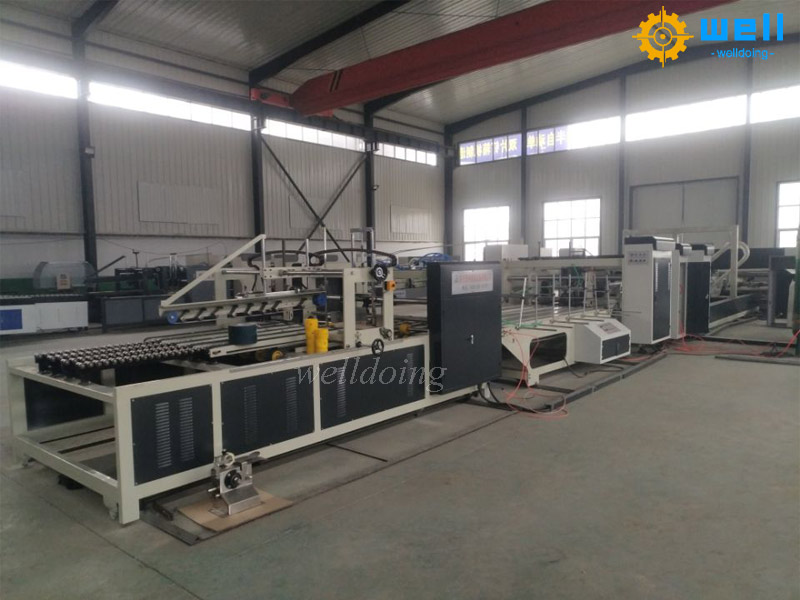 Automatic cardboard box folding gluing machine