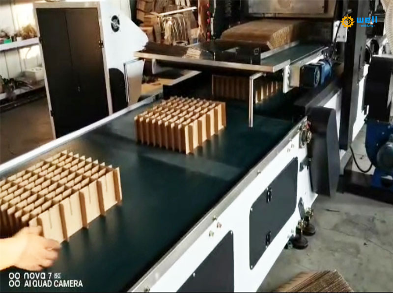 Automatic cardboard carton partition assembly machine