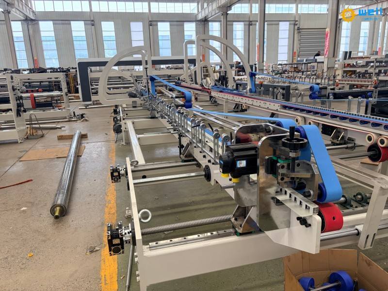 WD-How much does an automatic carton box folder gluer stitching machine cost WD-How much does an automatic carton box folder gluer stitching machine cost