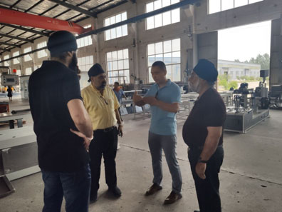 Indian clients come to our factory to visit the paper pipe machine. 