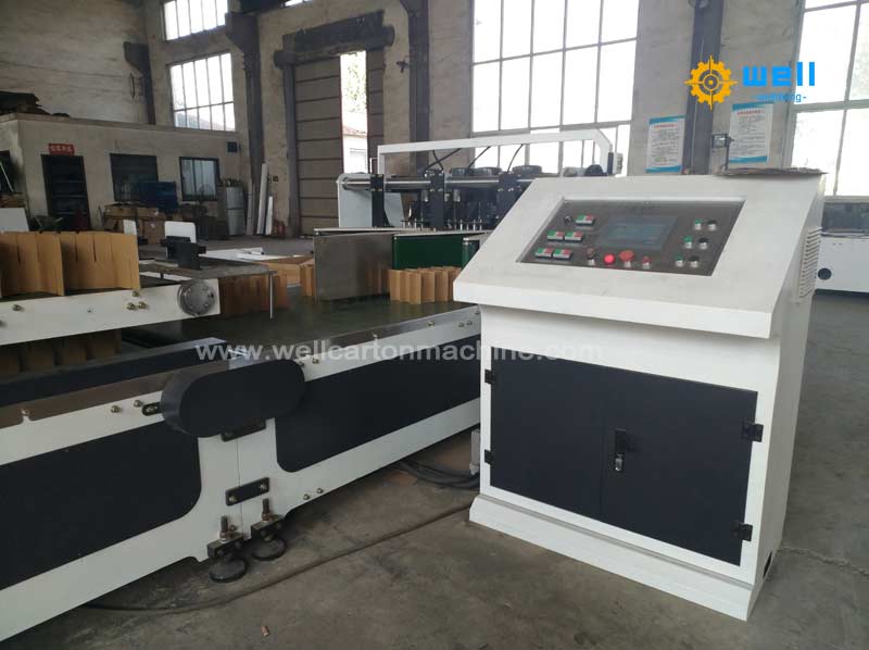 Corrguted box partition assembler machinery