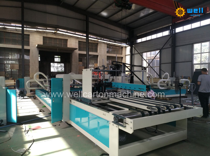 Automatic folding gluing machine