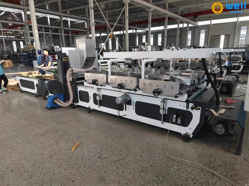 Automatic carton box partition assembler machine